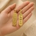 Egyptian Jewelry Double-Faced 18k Gold Cartouche with Alphabet Table and Notched Background