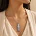 Silver Cartouche with Hollowed out Filigree Border