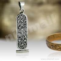 Silver Double Sided Egyptian Cartouche with hieroglyphic symbols table and dark background